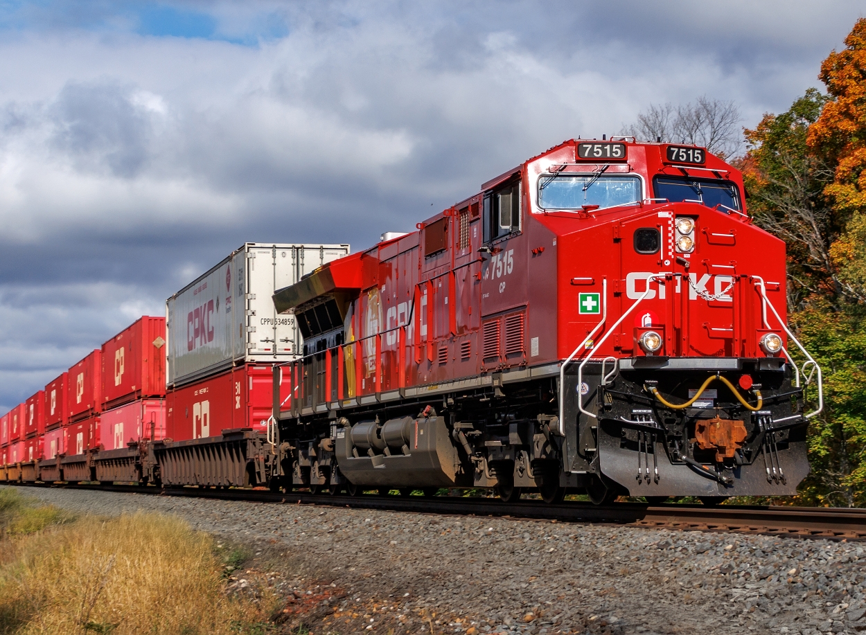 CPKC locomotive in autumn